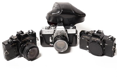 Lot 882 - Minolta SLR cameras