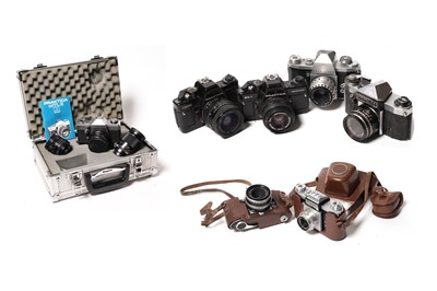 Lot 888 - A collection of Prakitca; and Praktina SLR cameras