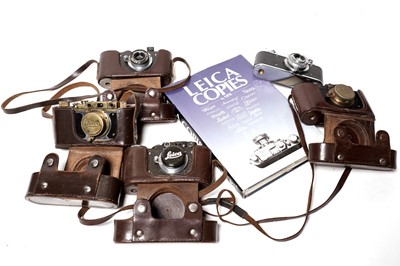 Lot 890 - Five rangefinder cameras; together with a book titled ‘Leica Copies’