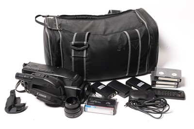 Lot 901 - A Canon E700 video camcorder; and accessories.