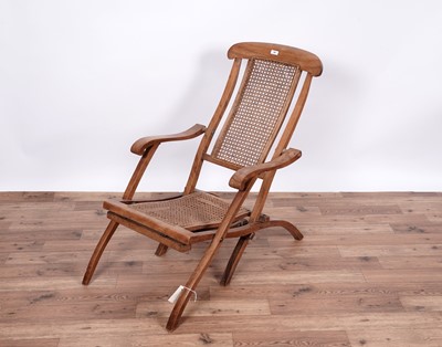 Lot 68 - A Vintage walnut canework steamer chair