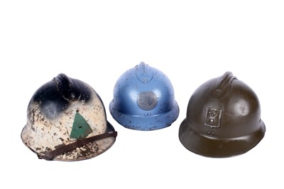 Lot 194 - A Second World War French Artillery M26 pattern Adrian steel helmet and two others