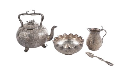 Lot 31 - An early 20th century Indian plated three-piece tea set; and matching spoon