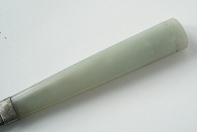 Lot 877 - A Chinese carved jade dagger and sheath; and a carved jade medallion