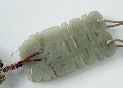 Lot 877 - A Chinese carved jade dagger and sheath; and a carved jade medallion