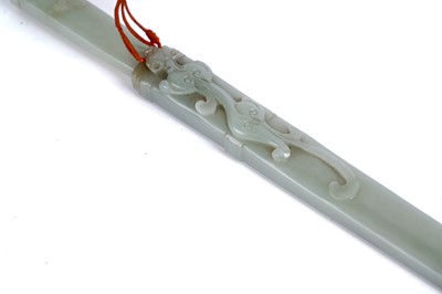 Lot 877 - A Chinese carved jade dagger and sheath; and a carved jade medallion