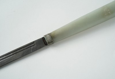 Lot 877 - A Chinese carved jade dagger and sheath; and a carved jade medallion