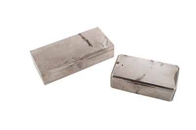 Lot 416 - A George V silver cigarette box; and another longer silver cigarette box