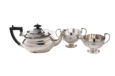 Lot 23 - A George V silver teapot; and other items