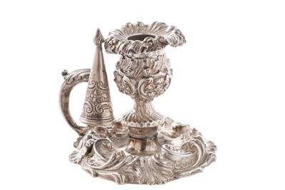 Lot 174 - A George IV silver chamberstick and matching conical snuffer