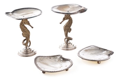 Lot 1 - A pair of Elizabeth II silver and parcel gilt tazzae; and two dishes