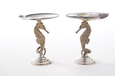 Lot 1 - A pair of Elizabeth II silver and parcel gilt tazzae; and two dishes