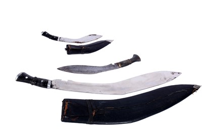 Lot 115 - An oversized Indian Kukri knife; and two others