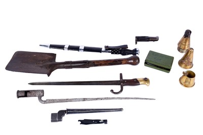 Lot 121 - A First World War Imperial German trench shovel; and other military items