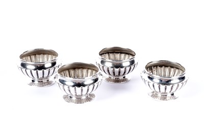 Lot 1006 - A set of four silver table salts by Harwood, Plante & Harrison