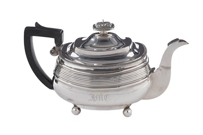 Lot 109 - A George III North Country provincial silver teapot