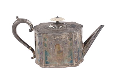 Lot 110 - A Victorian engraved silver teapot