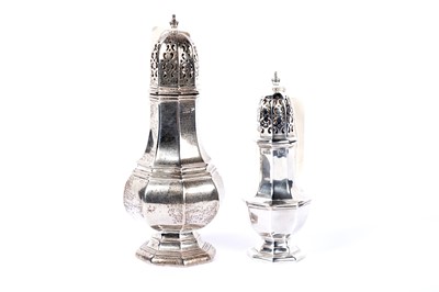 Lot 1007 - Two silver sugar casters by Walker & Hall