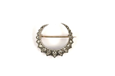 Lot 777 - A Victorian diamond crescent brooch