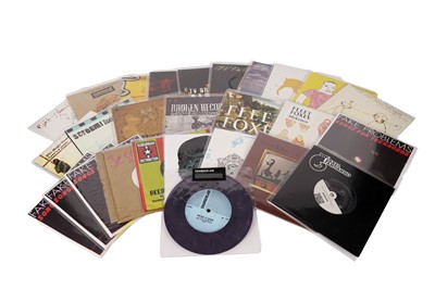 Lot 518 - A collectors' bundle of mixed modern 7" singles