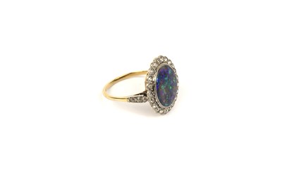 Lot 765 - A early 20th Century black-opal and diamond cluster ring