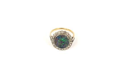 Lot 765 - A early 20th Century black-opal and diamond cluster ring