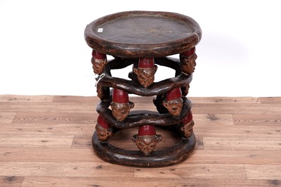 Lot 22 - An early 20th Century Bamileke style South African stool