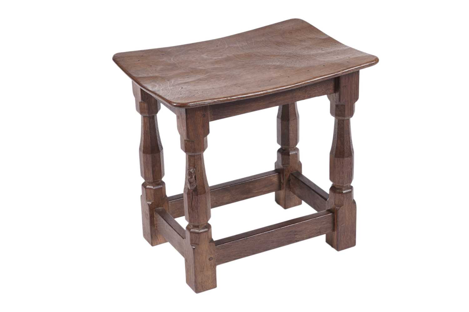 Lot 1470 - Robert ‘Mouseman’ Thompson of Kilburn: an oak dish-top stool