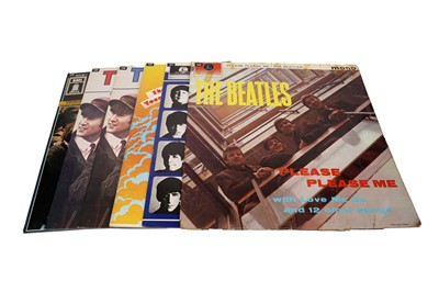 Lot 584 - Six records by The Beatles