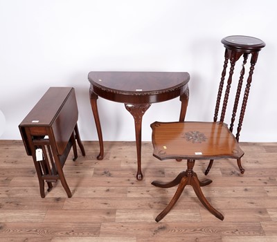 Lot 71 - A 19th Century style mahogany jardinière stand; and three tables