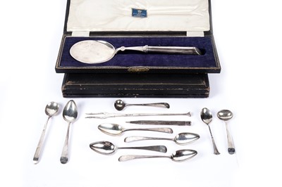 Lot 1105 - A collection of silver items including: a silver tartlet slice by Levesley Brothers