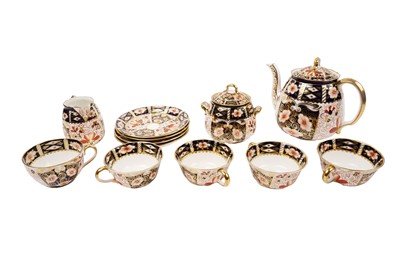 Lot 377 - A Royal Crown Derby ‘Imari’ 2451 pattern part tea service