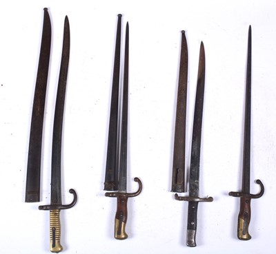 Lot 100 - Three French bayonets; and one Czech bayonet