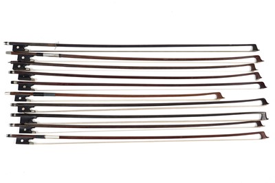 Lot 64 - Ten assorted violin bows, two stamped