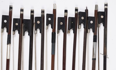 Lot 64 - Ten assorted violin bows, two stamped