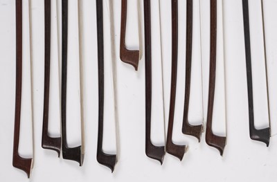 Lot 64 - Ten assorted violin bows, two stamped
