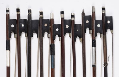 Lot 64 - Ten assorted violin bows, two stamped