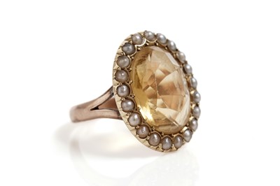 Lot 768 - A Victorian citrine and seed pearl cluster ring