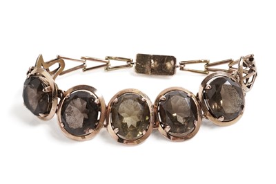 Lot 800 - An Egyptian smoky quartz bracelet