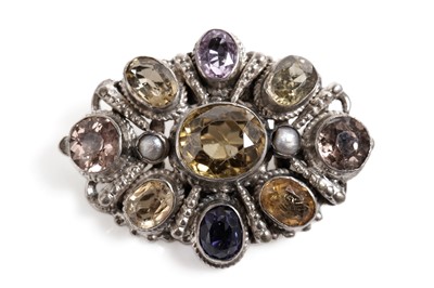 Lot 808 - An amethyst, citrine, blue sapphire and coloured gemstone brooch