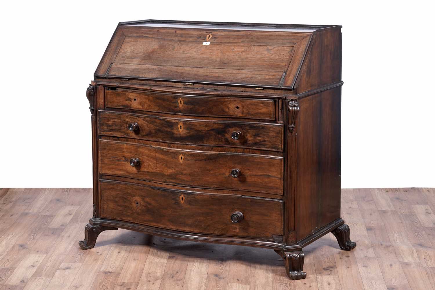 Lot 4 - A substantial 19th Century Continental rosewood serpentine fronted bureau