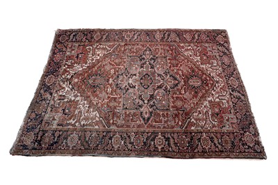 Lot 130 - A Caucasian Heriz carpet