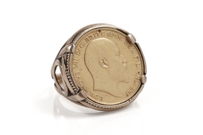 Lot 709 - A George VII gold half sovereign ring