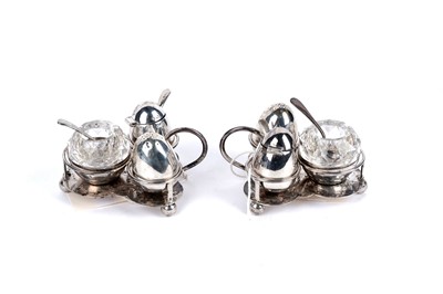 Lot 295 - A pair of Victorian silver condiment stands