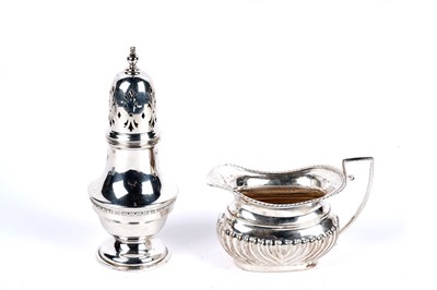 Lot 294 - An Edwardian silver cream jug; and a silver sugar caster