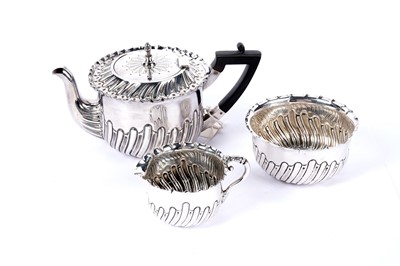 Lot 1041 - A three-piece silver tea service by Lee & Wigfull