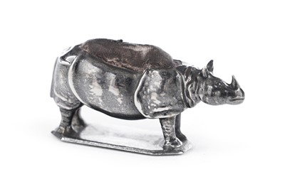 Lot 443 - A rare Edwardian silver novelty pin cushion in the form of a miniature rhinoceros