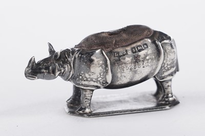 Lot 443 - A rare Edwardian silver novelty pin cushion in the form of a miniature rhinoceros