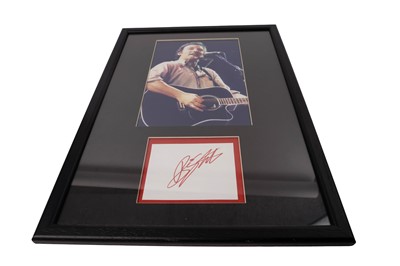 Lot 338 - A framed print and autograph of Bruce Springsteen