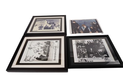 Lot 607 - Four signed band photographs